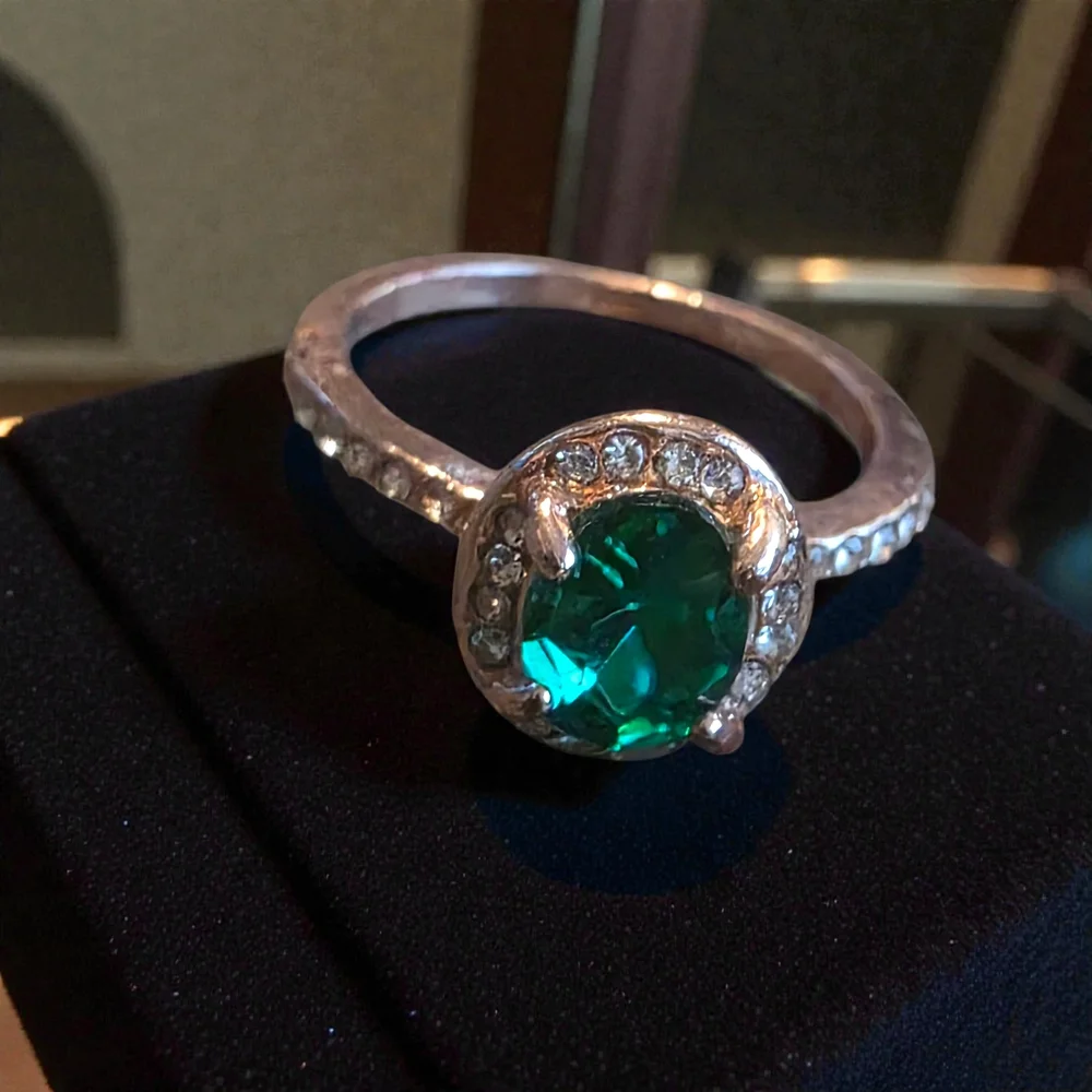 Silver and Green Gemstone Ring.